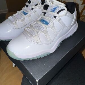 Jordan Retro 11 low . Size 2.5 Y